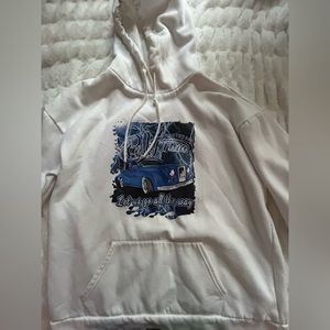oversized white hoodie with blue graphic design